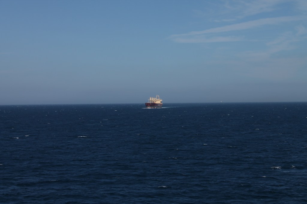 ship on blue water 