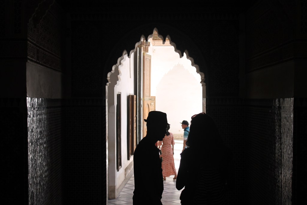 silhouettes in ornate doorway