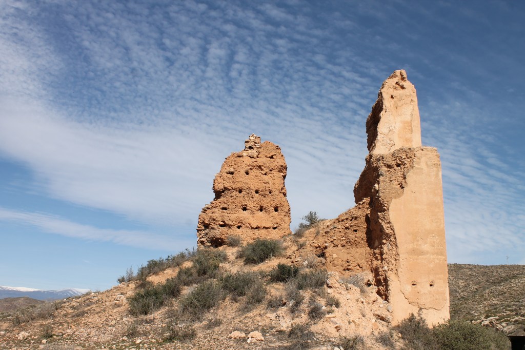 ruins against cloudy blue sky