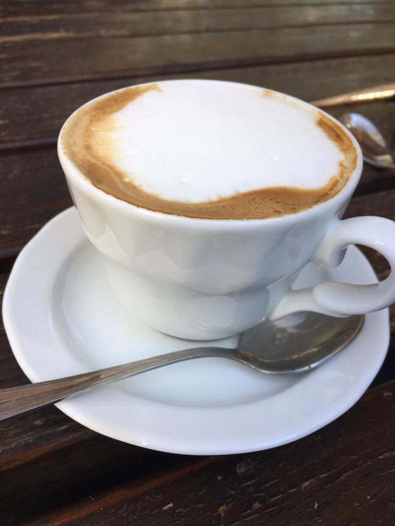 cup and saucer with italian coffee