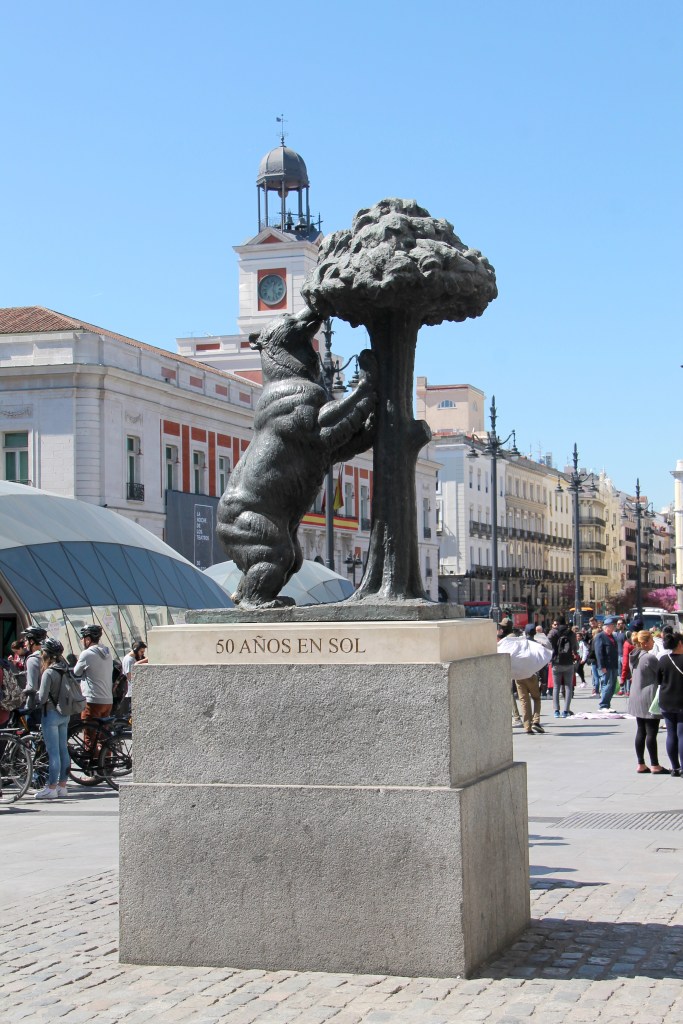 famous statue of bear sniffing tree