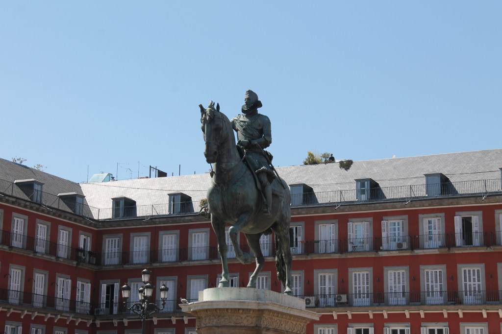 statue of horse and rider in plaza