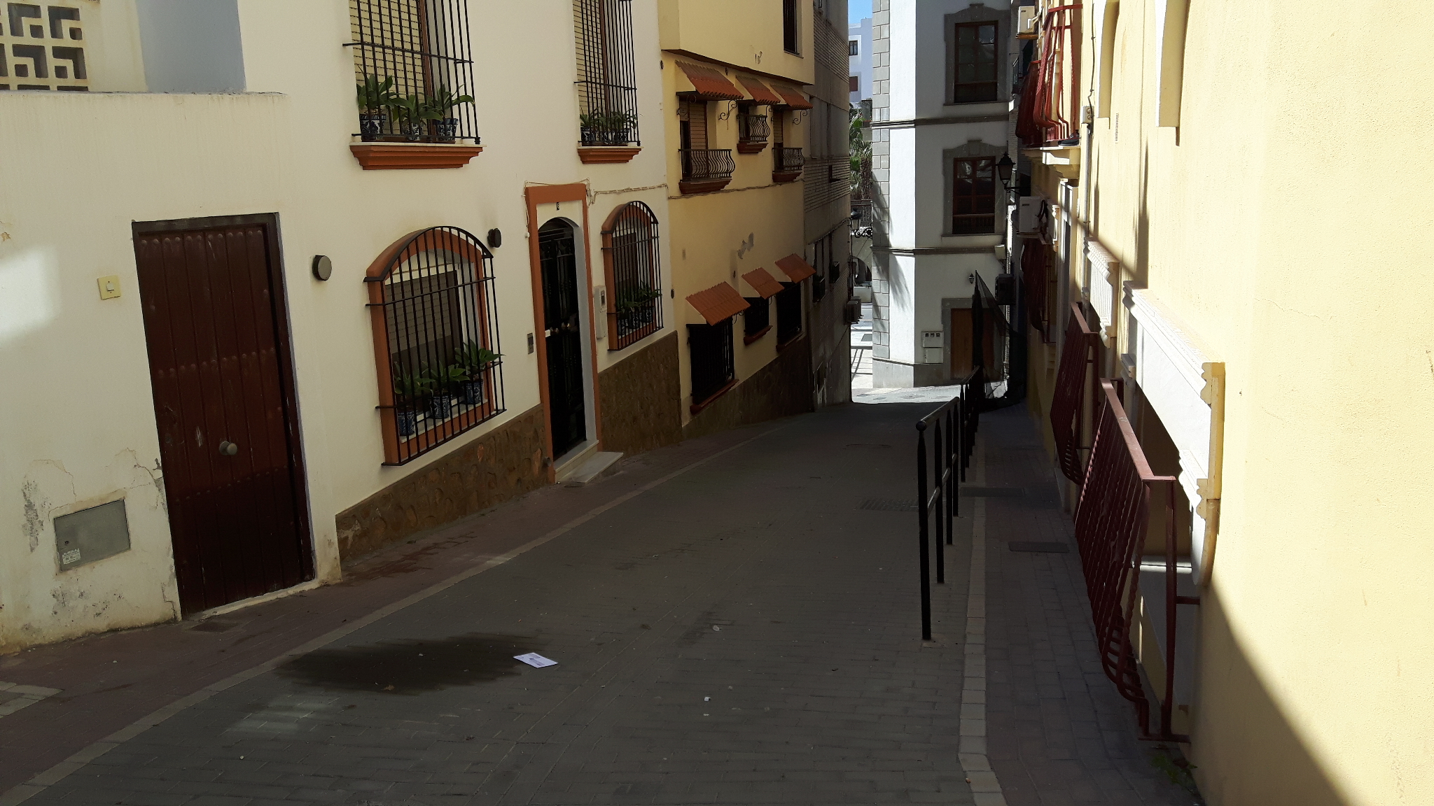 narrow Spanish residential street