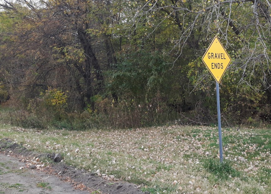 gravel ends road sign